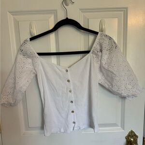 White shirt with buttons and crochet sleeves